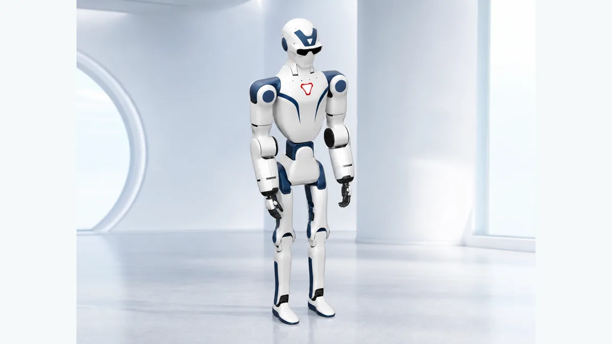 Robot humanoïde Unitree R1, corps blanc et bleu, présenté debout en studio